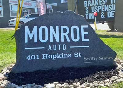 Monroe Auto, 40 Hopkins St Engraved on large stone